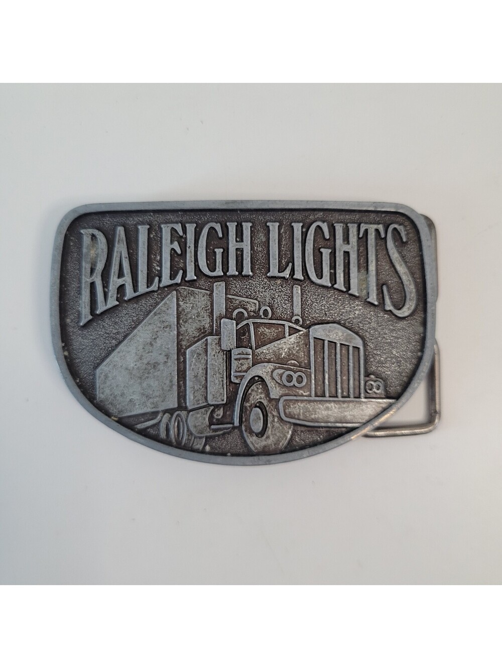 Raleigh Lights Trucker Belt Buckle Semi Truck 3" Metal Trucking